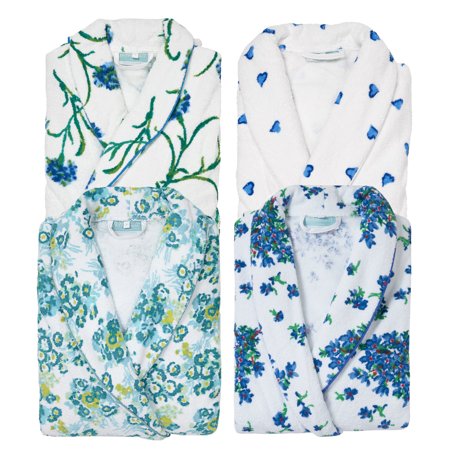 Two floral-patterned robes on a white background