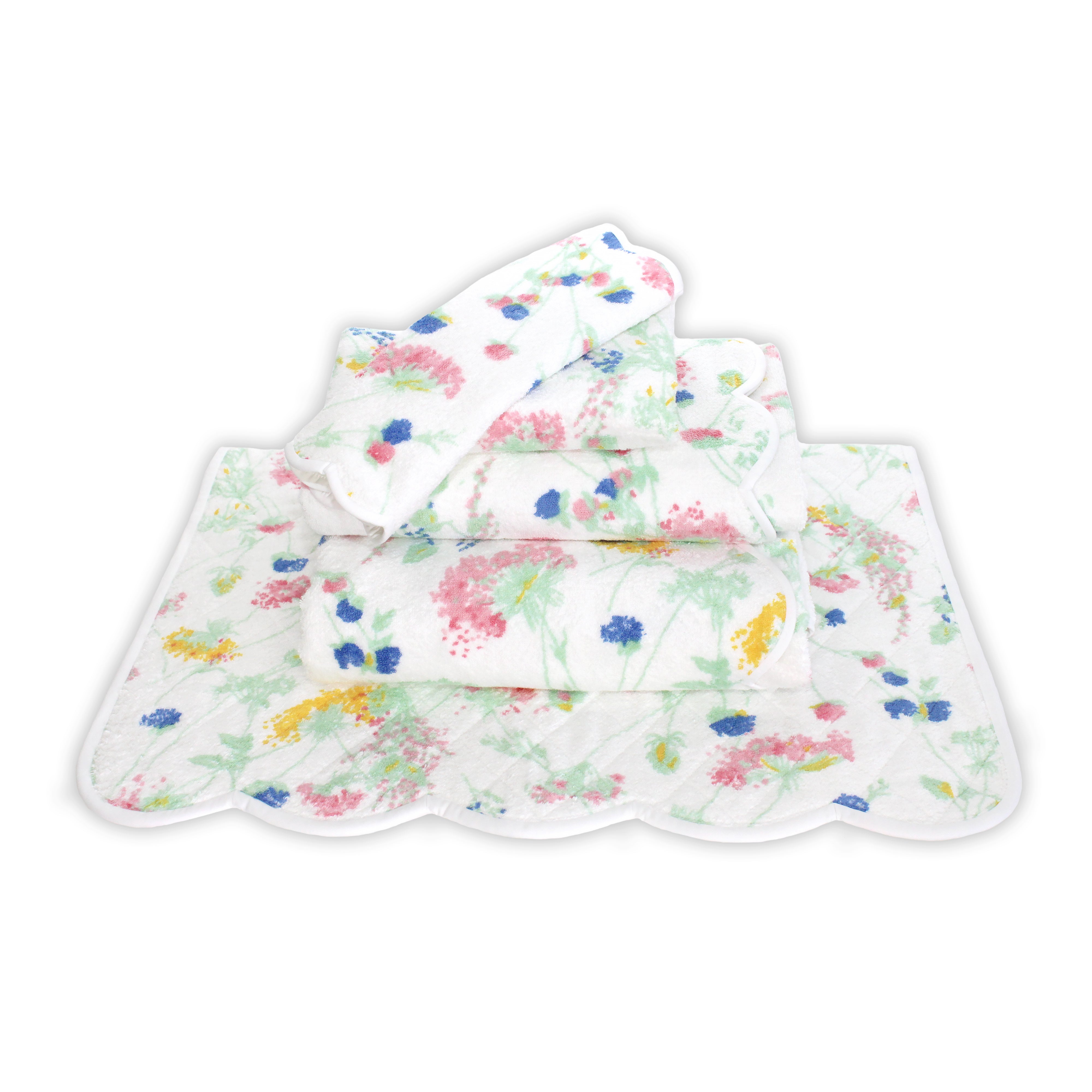 Printed blue, pink and yellow florals with green leaves/stems, Chardon Luzerne Print, Folded Towel stack. Showing 1 of each size, from bottom to the top: Bathmat, Bath Sheet, Bath Towel, Hand Towel and Washcloth on a solid white background.