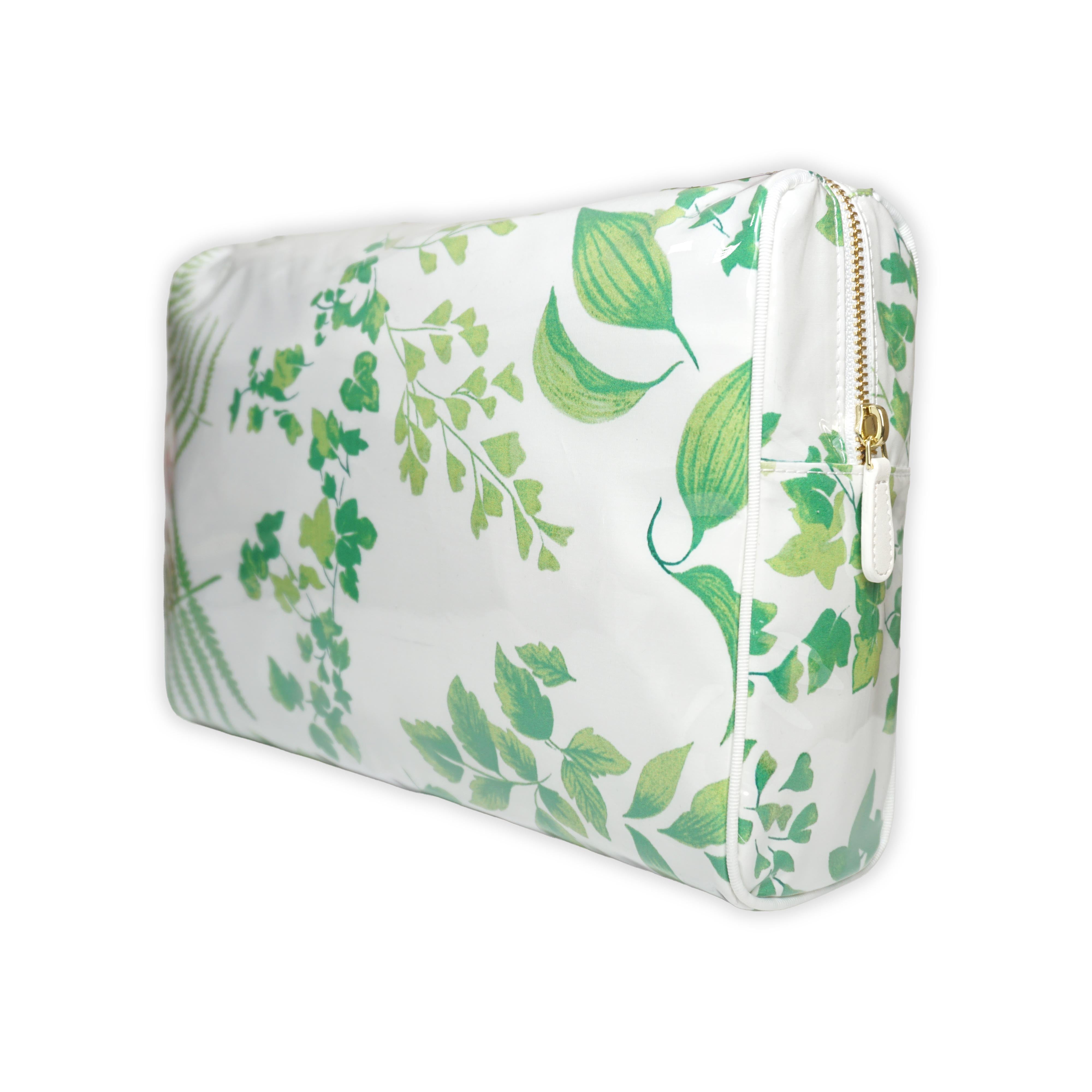 Large cosmetic bag featuring green hydrangea motifs in Mariage, with a brass zip closure along the top and an exterior front zip pocket.