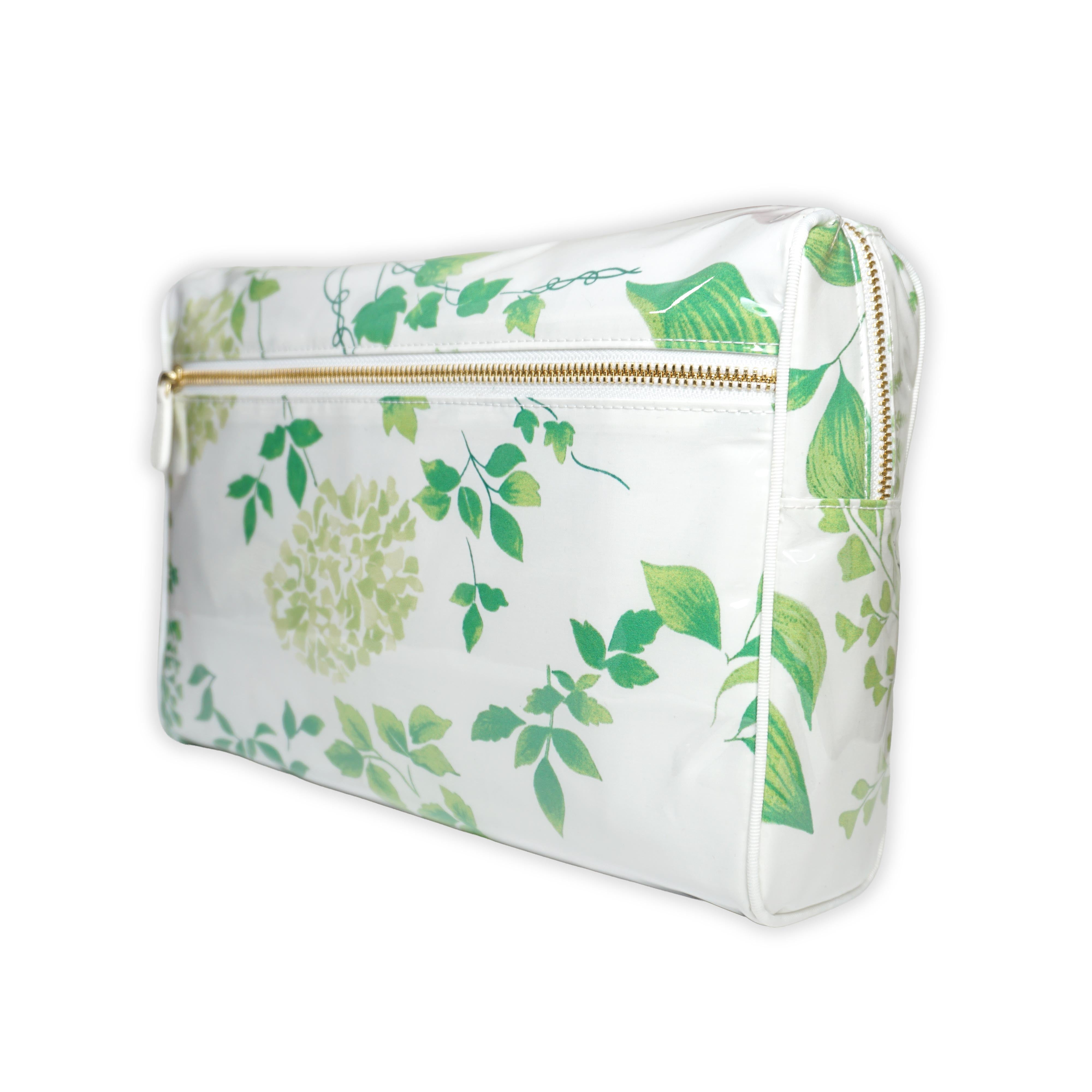 Large cosmetic bag featuring green hydrangea motifs in Mariage, with a brass zip closure along the top and an exterior front zip pocket.