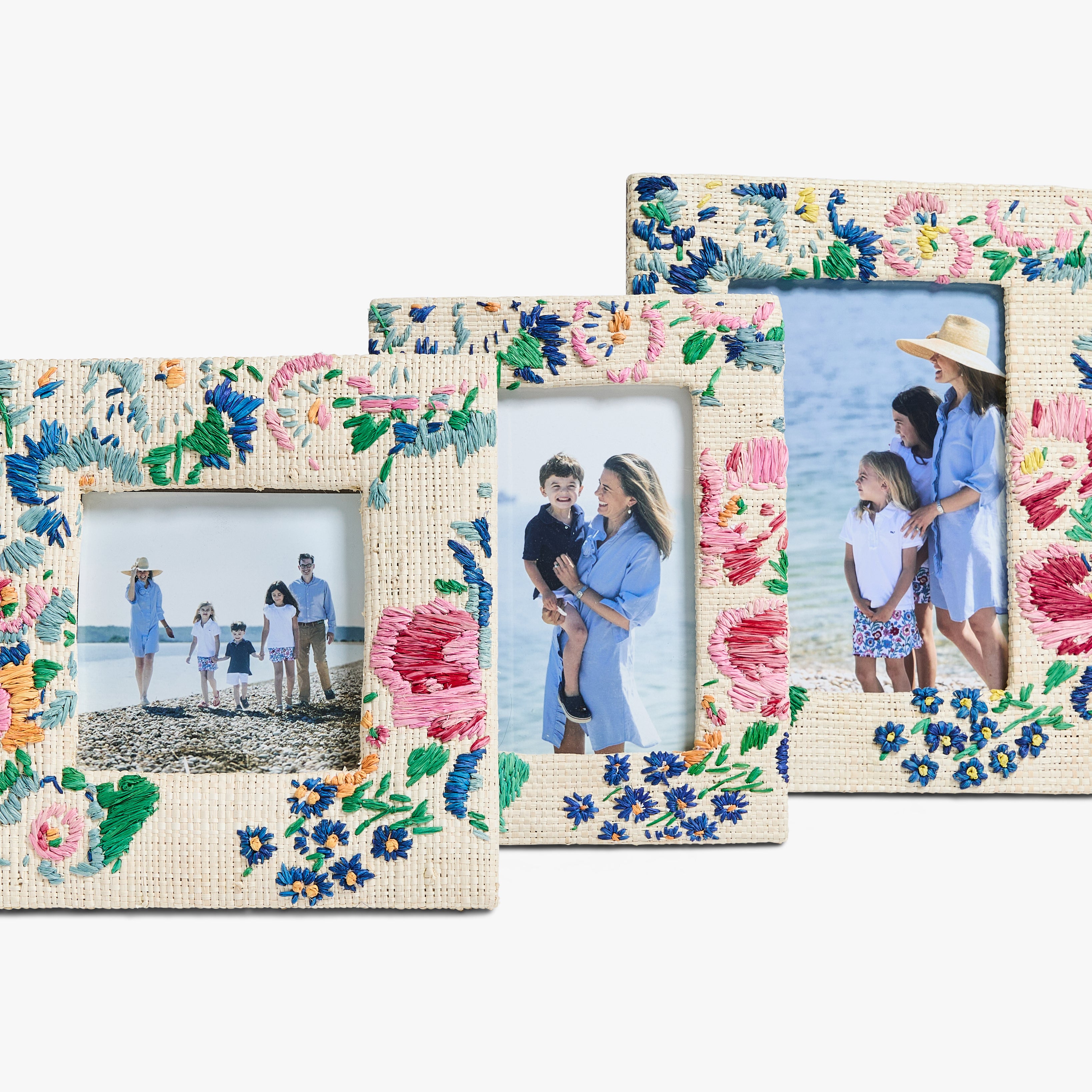 Floral photo frames with family photos on a white background