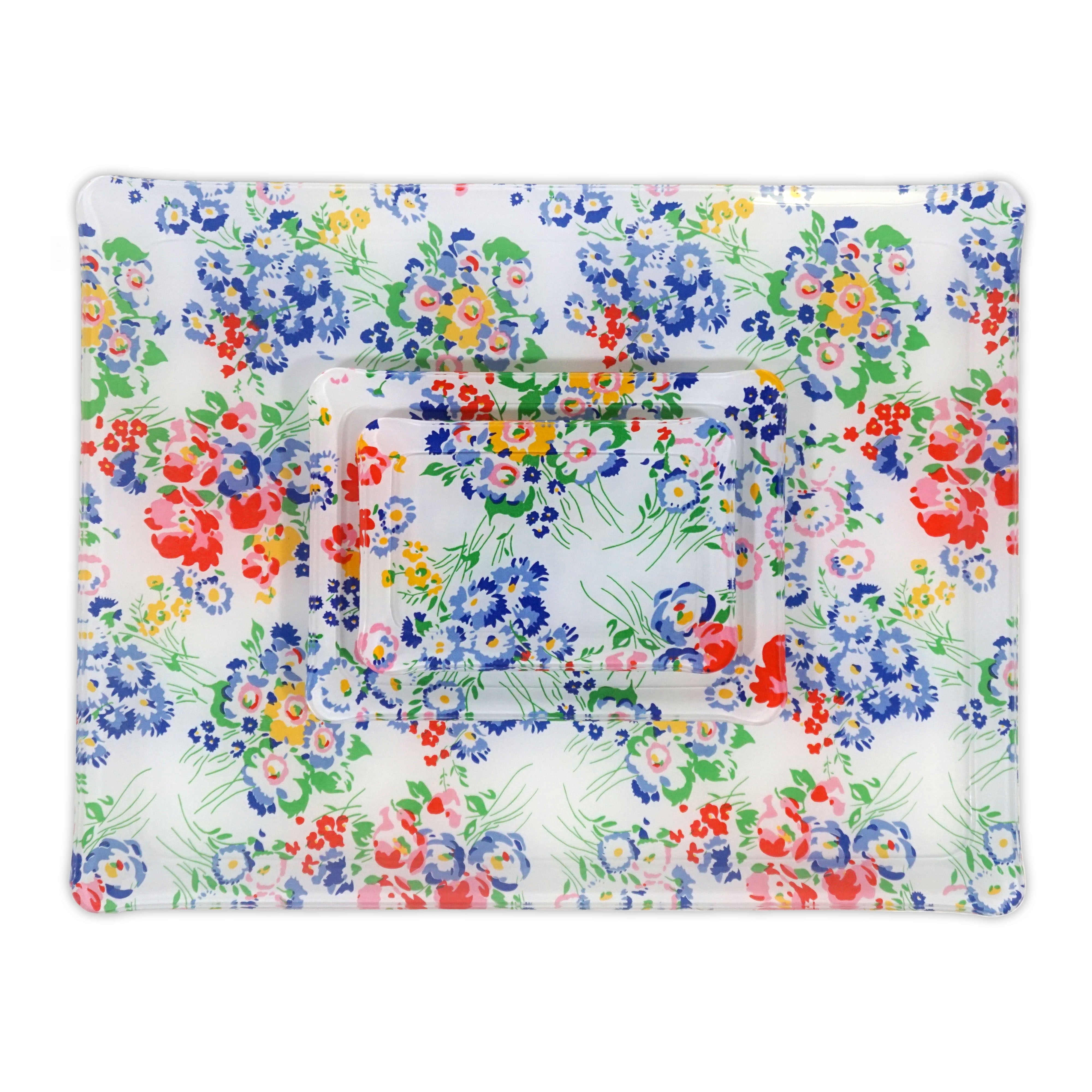 Printed Laminated Trays, group of all 3 trays, top to bottom: small, medium and large. Each tray in multi color florals in red, blue, pink and yellow with green leaves/stems, New York Mille Fleurs print.