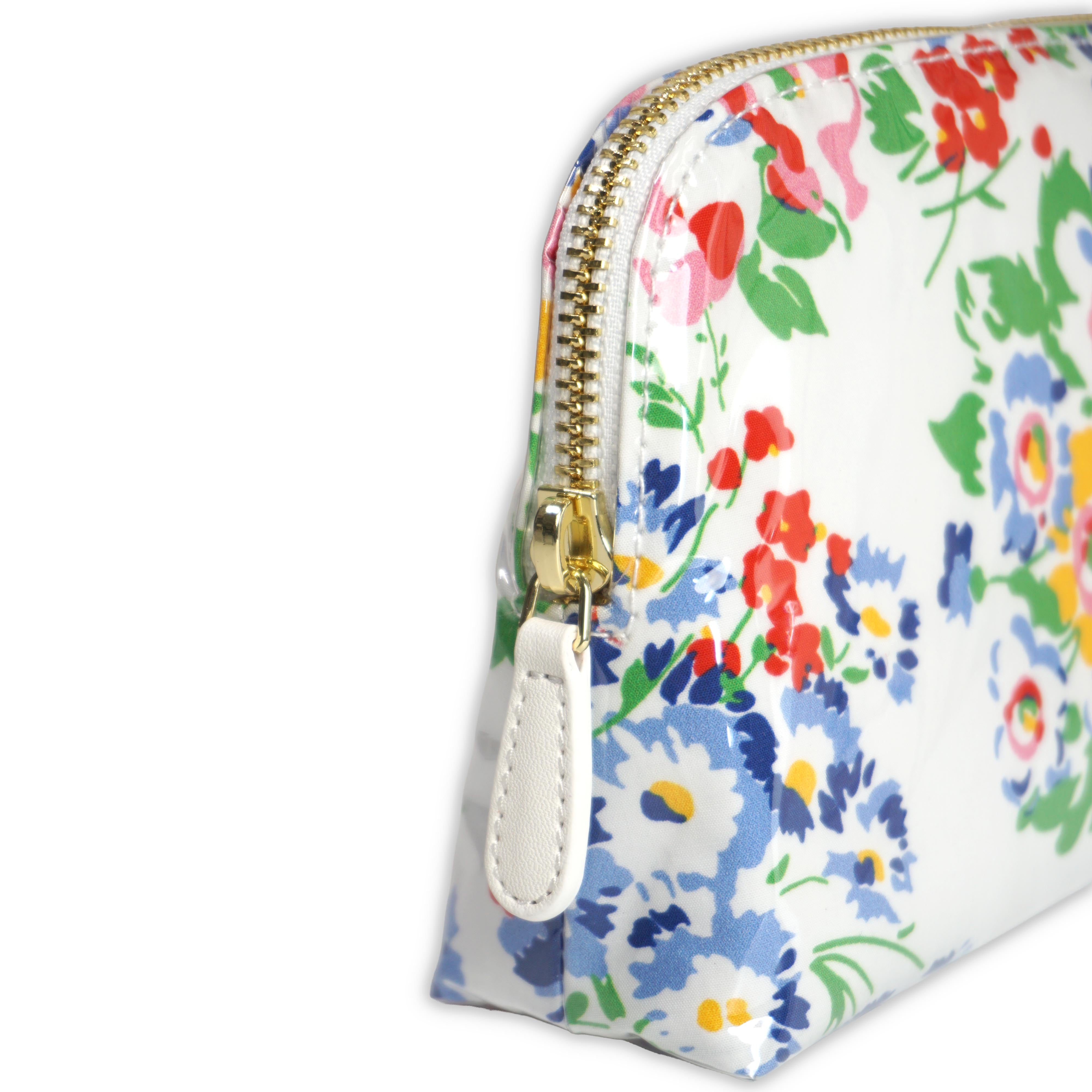 Small cosmetic pouch featuring multi colored floral motifs in New York Mille Fleurs, finished with a gold-tone brass zip closure.