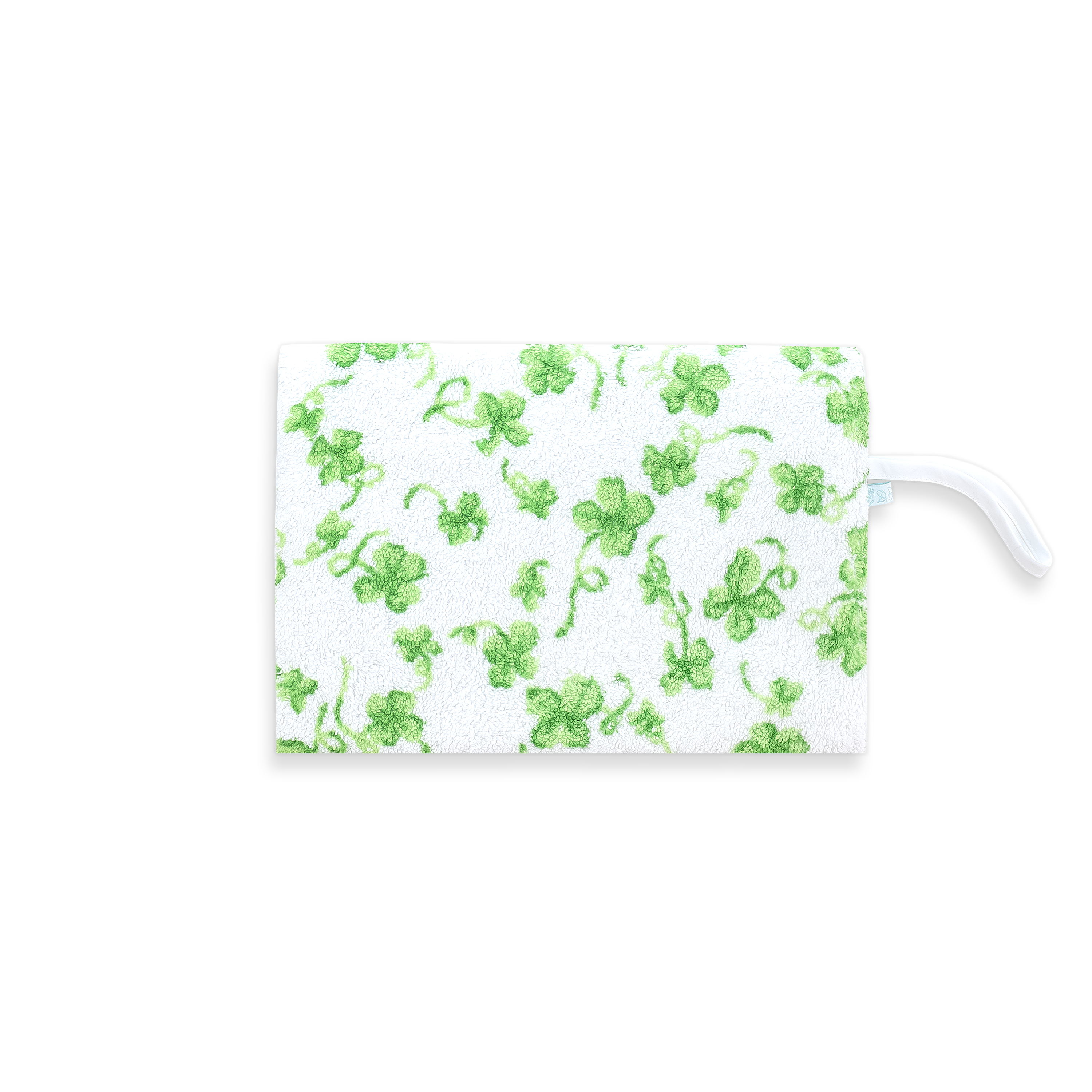 Green clover-patterned pouch, and white wrist band, on a white background