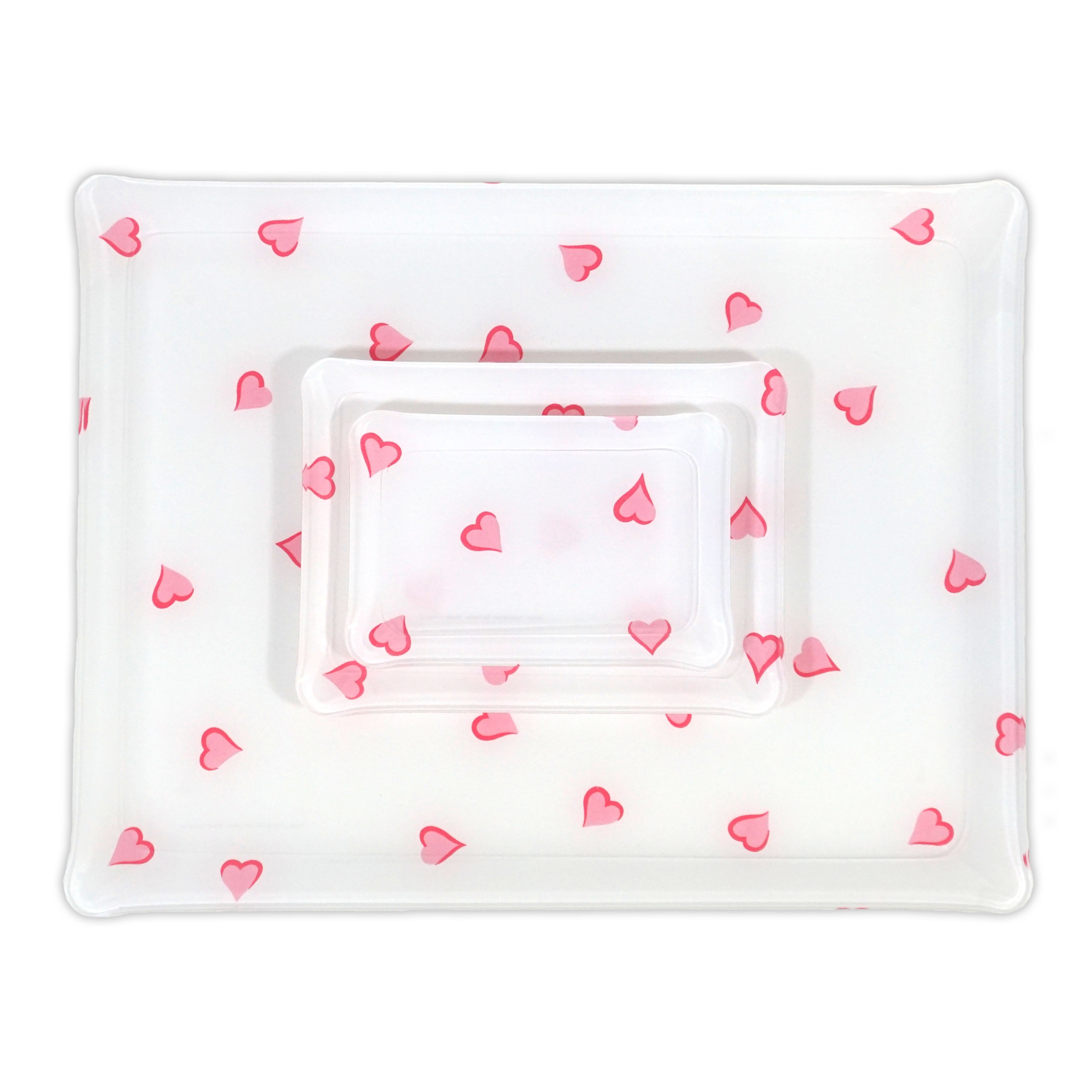 Printed Laminated Trays, group of all 3 trays, top to bottom: small, medium and large. Each tray in scattered pink hearts, Coeurs print.