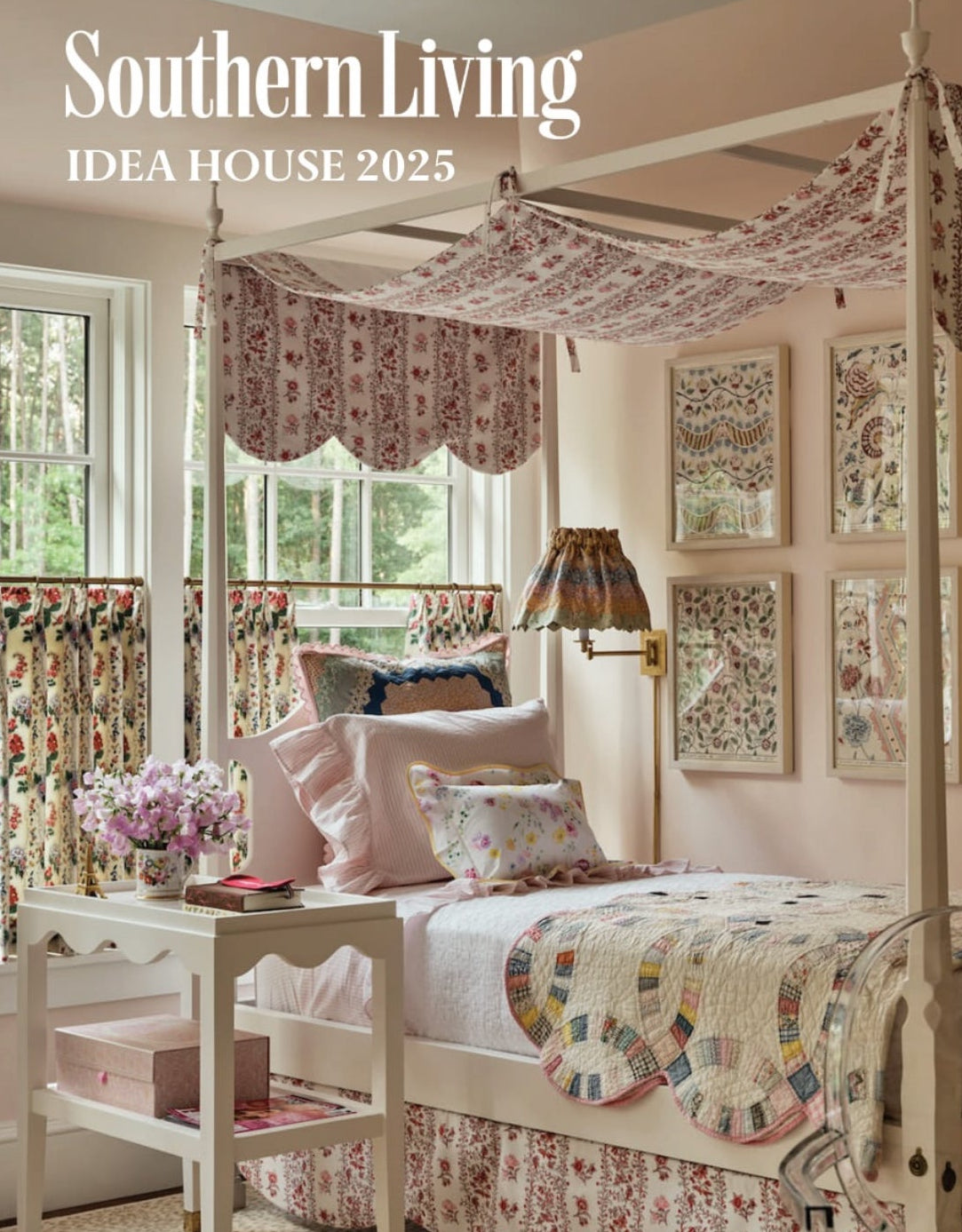 Cozy bedroom with a four-poster canopy bed, floral quilt, and soft pink pillows. It features floral curtains, framed art, and fresh flowers on a nightstand.