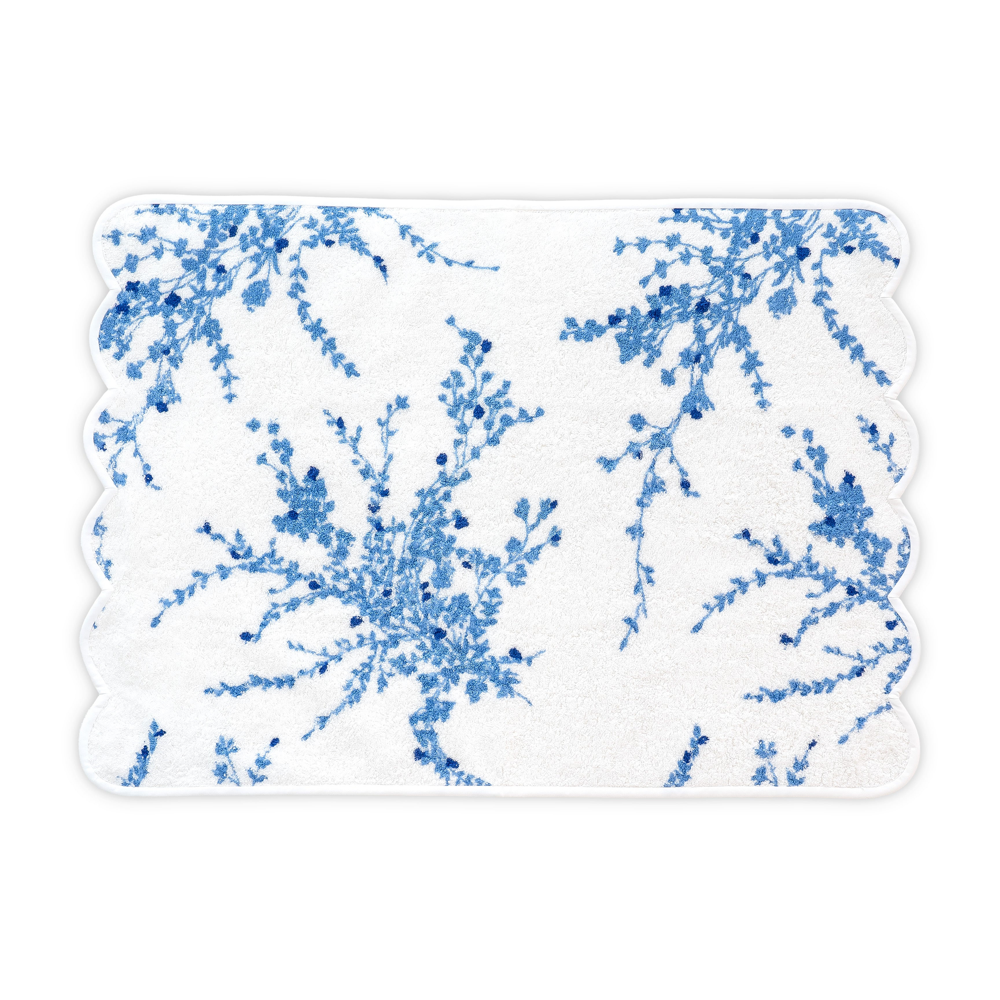 White Hand towel with blue floral print. Hand towel shows with a scallop white bias. On a white background.