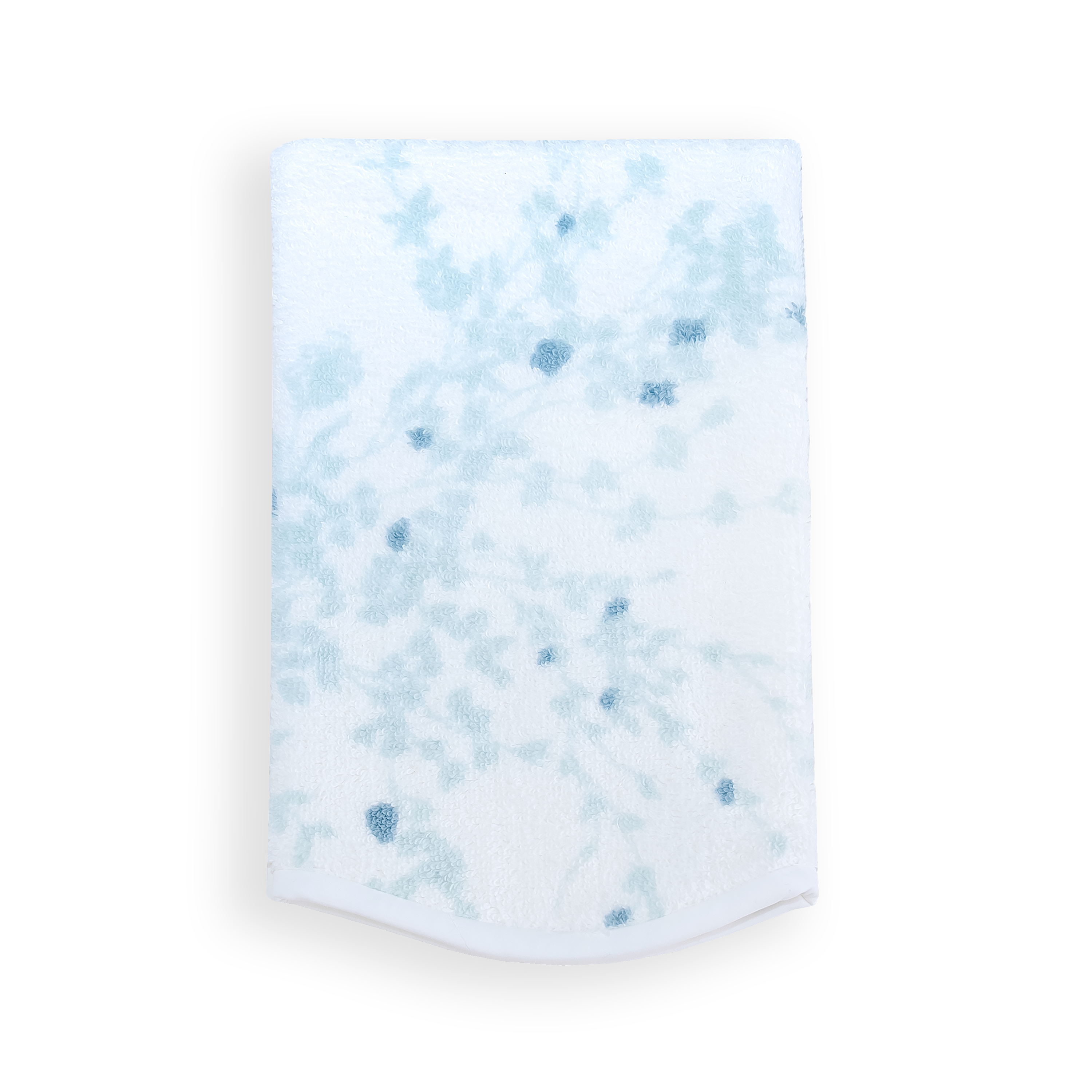 Soft white terry bath mitt featuring lush dp blue florals in jete de fleurs, finished with a clean white bias edge.