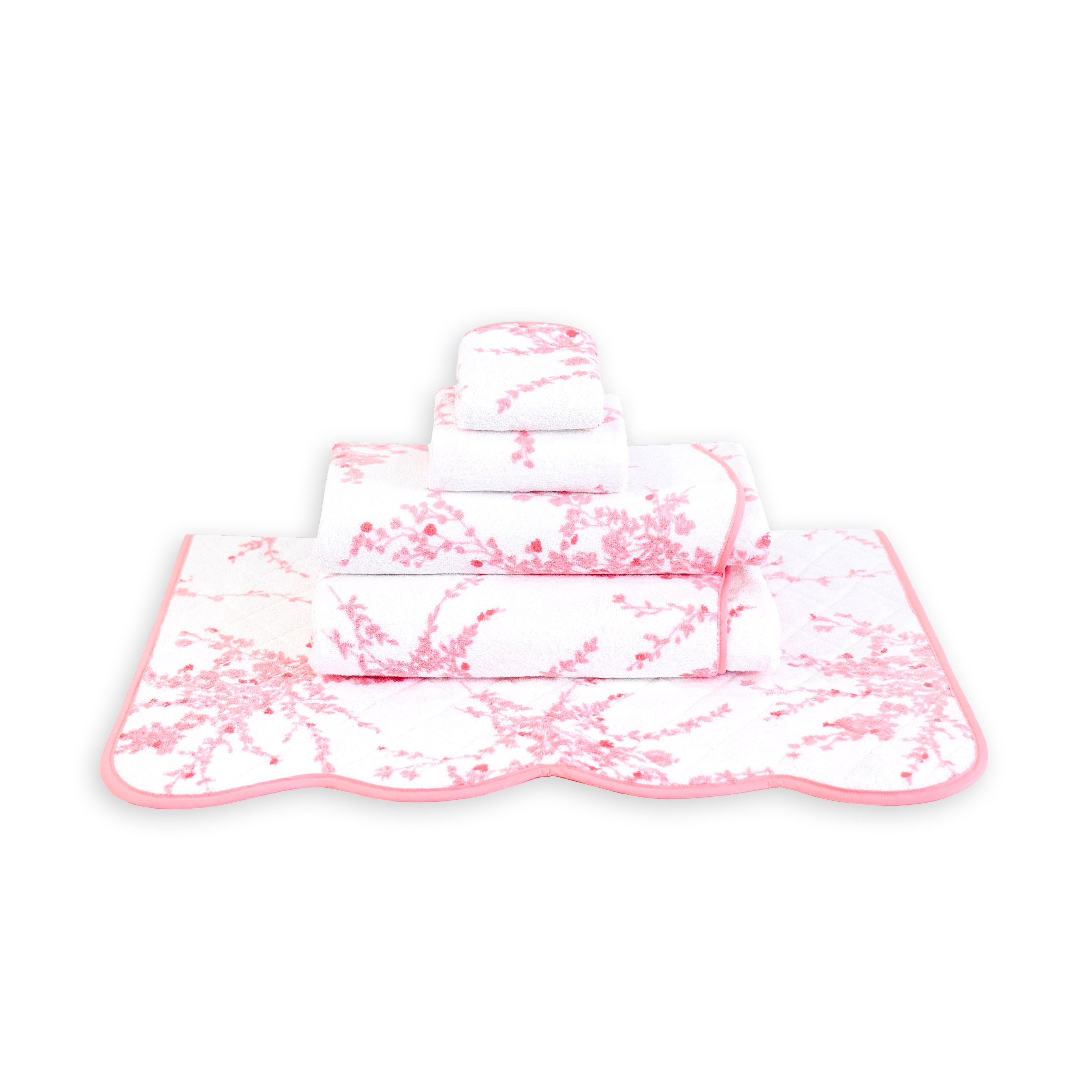 Printed pink florals, Jete de Fleurs print, Folded Towel stack. Showing 1 of each size, from bottom to the top: Bathmat, Bath Sheet, Bath Towel, Hand Towel and Washcloth on a solid white background.
