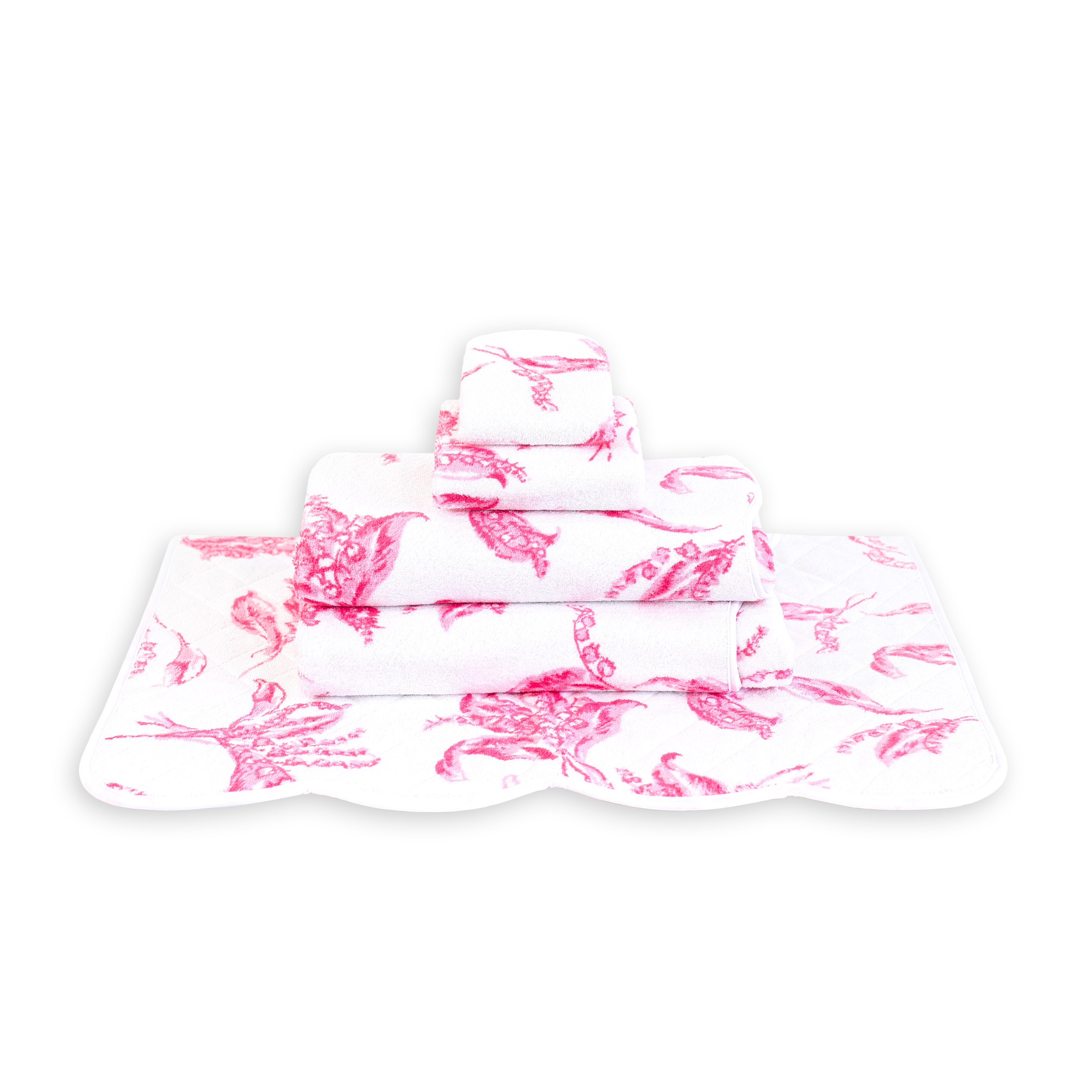 Printed pink lily of the valleys, Muguet print, Folded Towel stack. Showing 1 of each size, from bottom to the top: Bathmat, Bath Sheet, Bath Towel, Hand Towel and Washcloth on a solid white background.