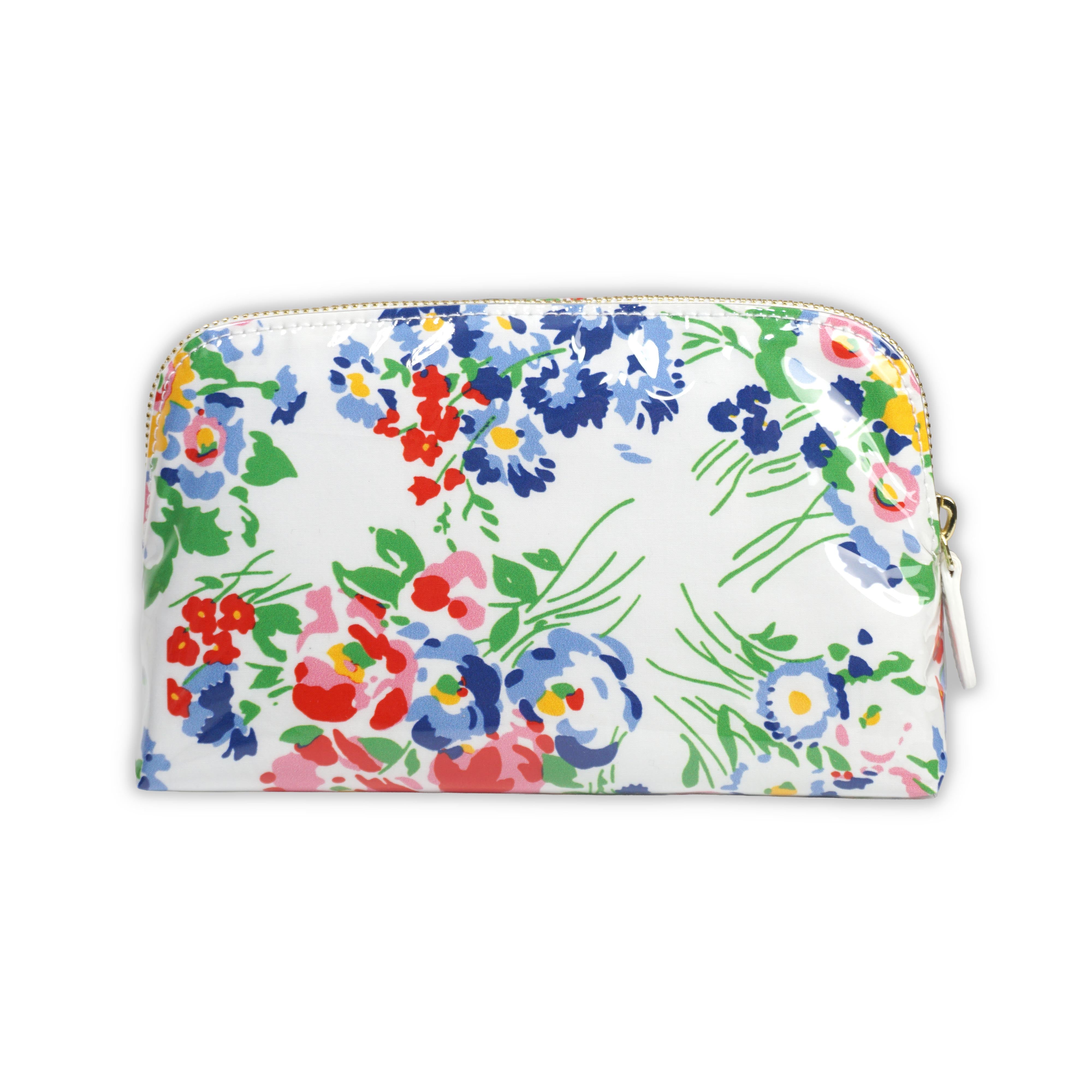 Small cosmetic pouch featuring multi colored floral motifs in New York Mille Fleurs, finished with a gold-tone brass zip closure.