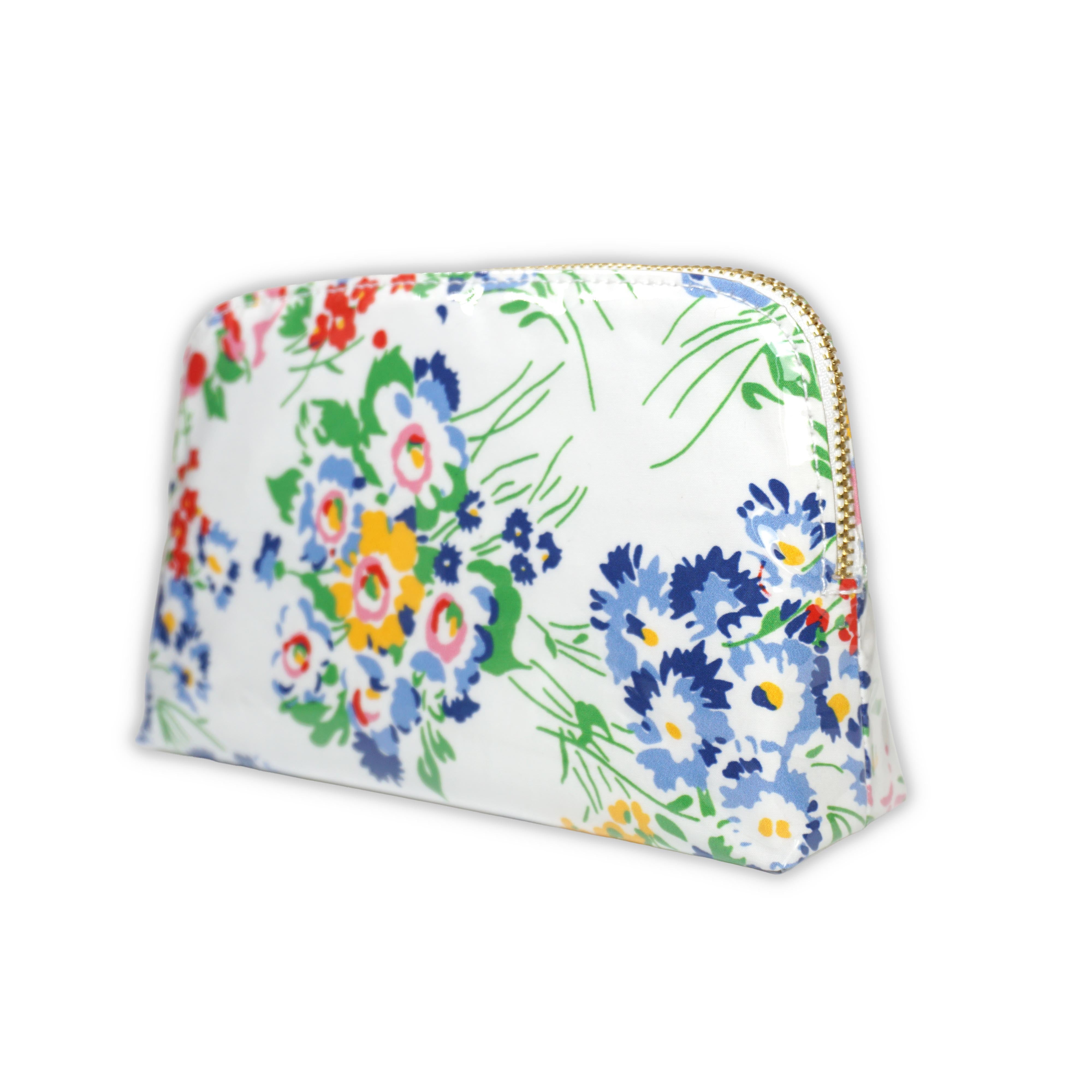 Small cosmetic pouch featuring multi colored floral motifs in New York Mille Fleurs, finished with a gold-tone brass zip closure.