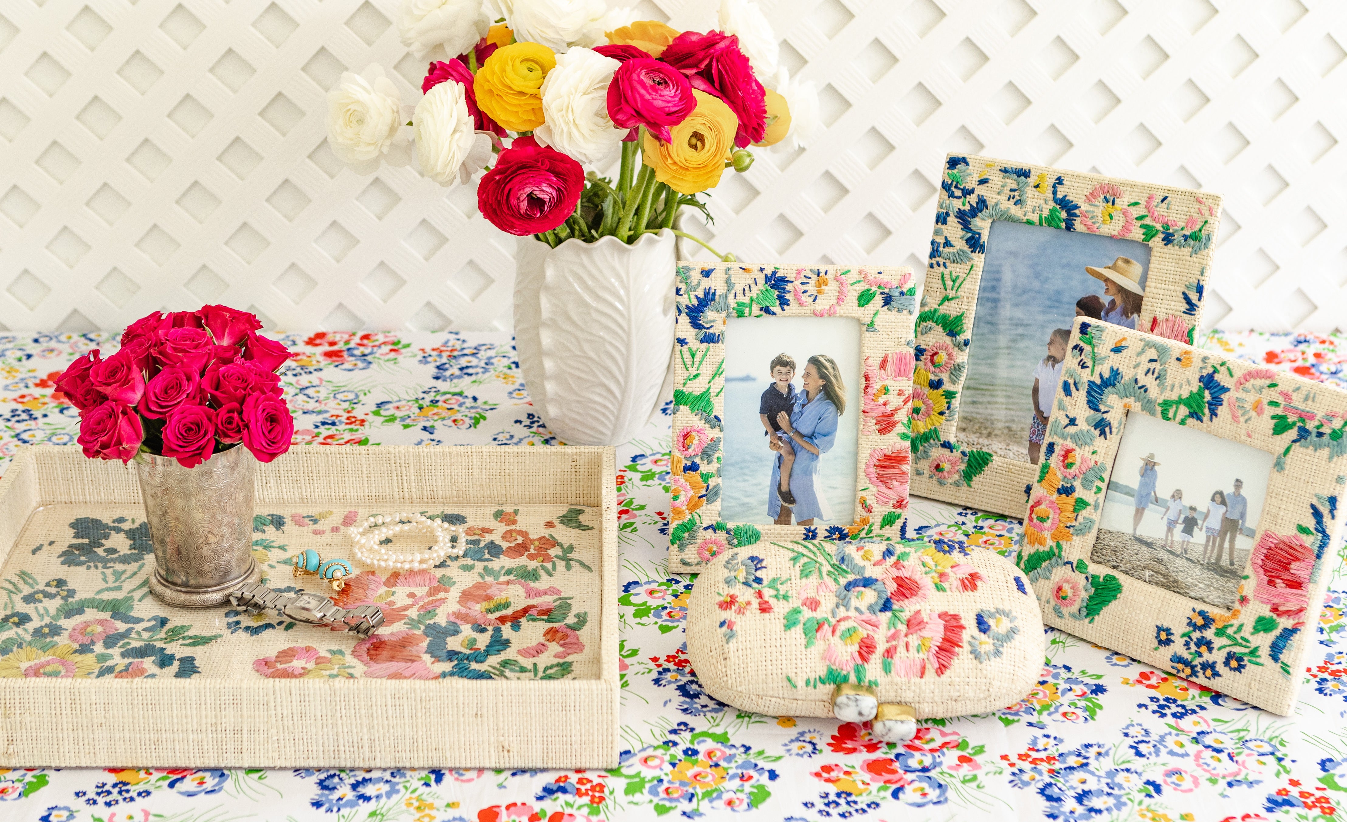 D. Porthault x Pamela Munson Holiday Capsule Collection, Limited Edition, with New York Mille Fleurs Multi floral print on rattan large tray, bag and 4 frames.