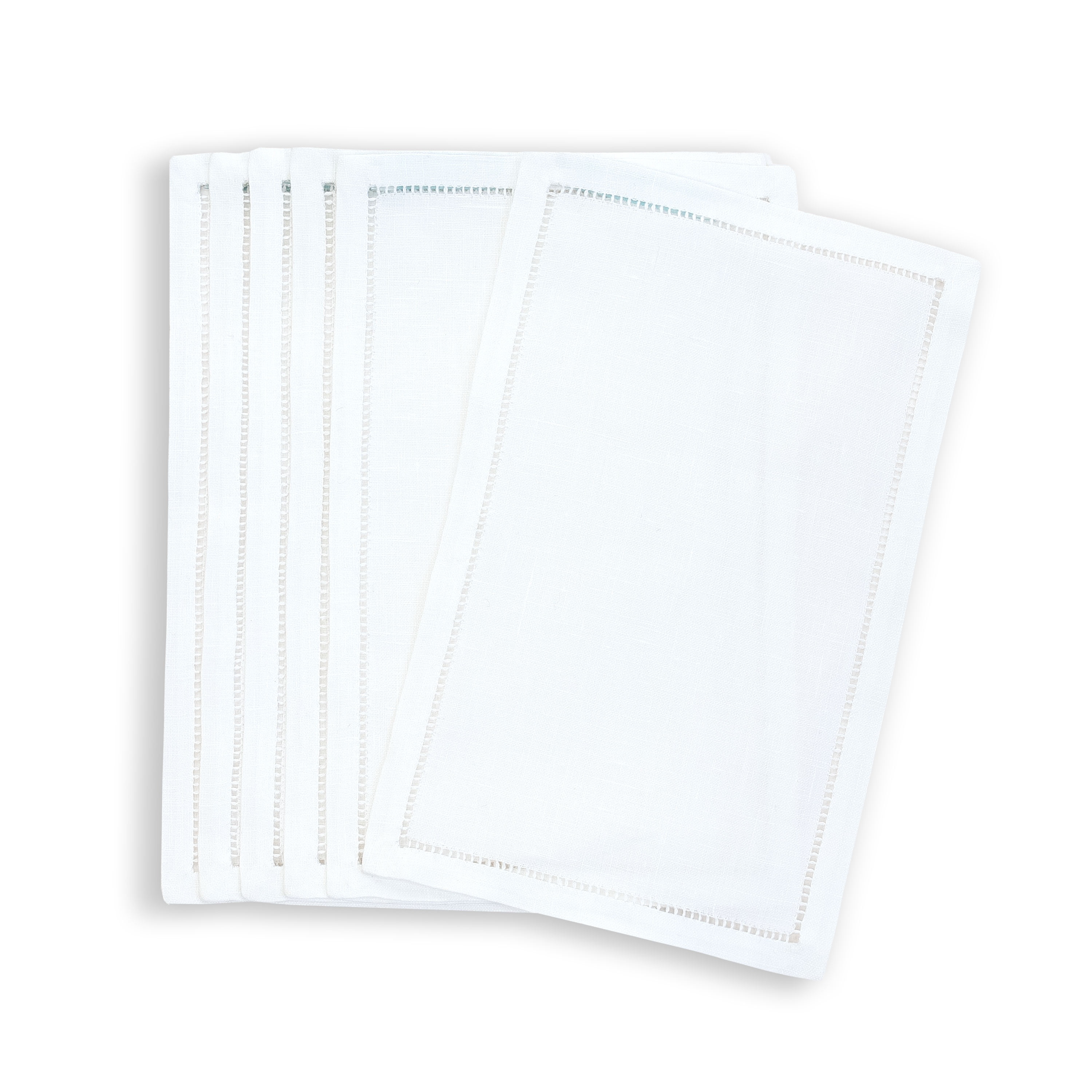 6 Solid white cocktail napkins showing simple jours embroidery with a white background.