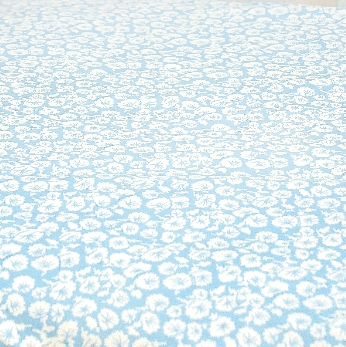 white florals on baby blue background pattern