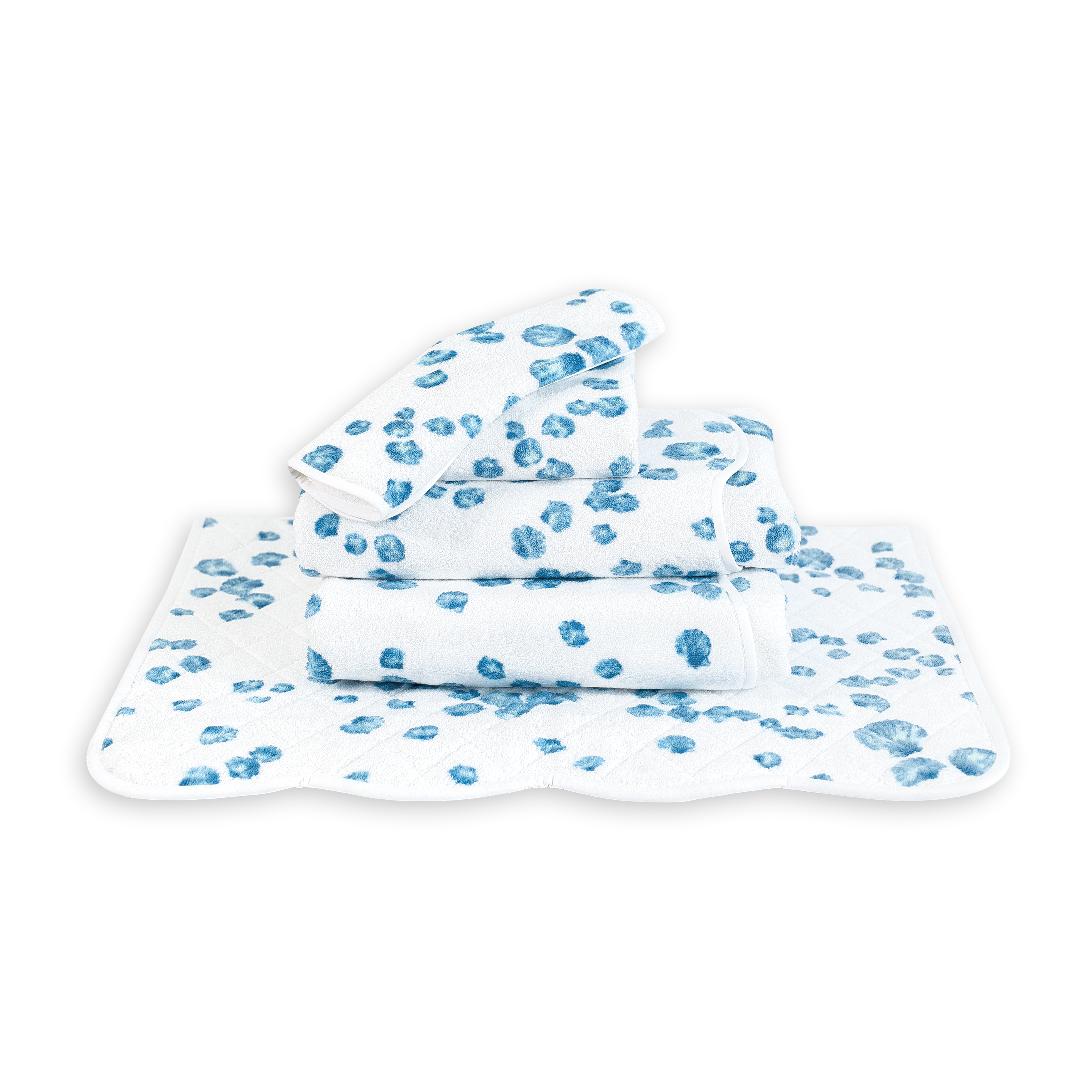 Printed Sea Shells Print, Folded Towel stack. Showing 1 of each size, from bottom to the top: Bathmat, Bath Sheet, Bath Towel, Hand Towel and Washcloth on a solid white background.
