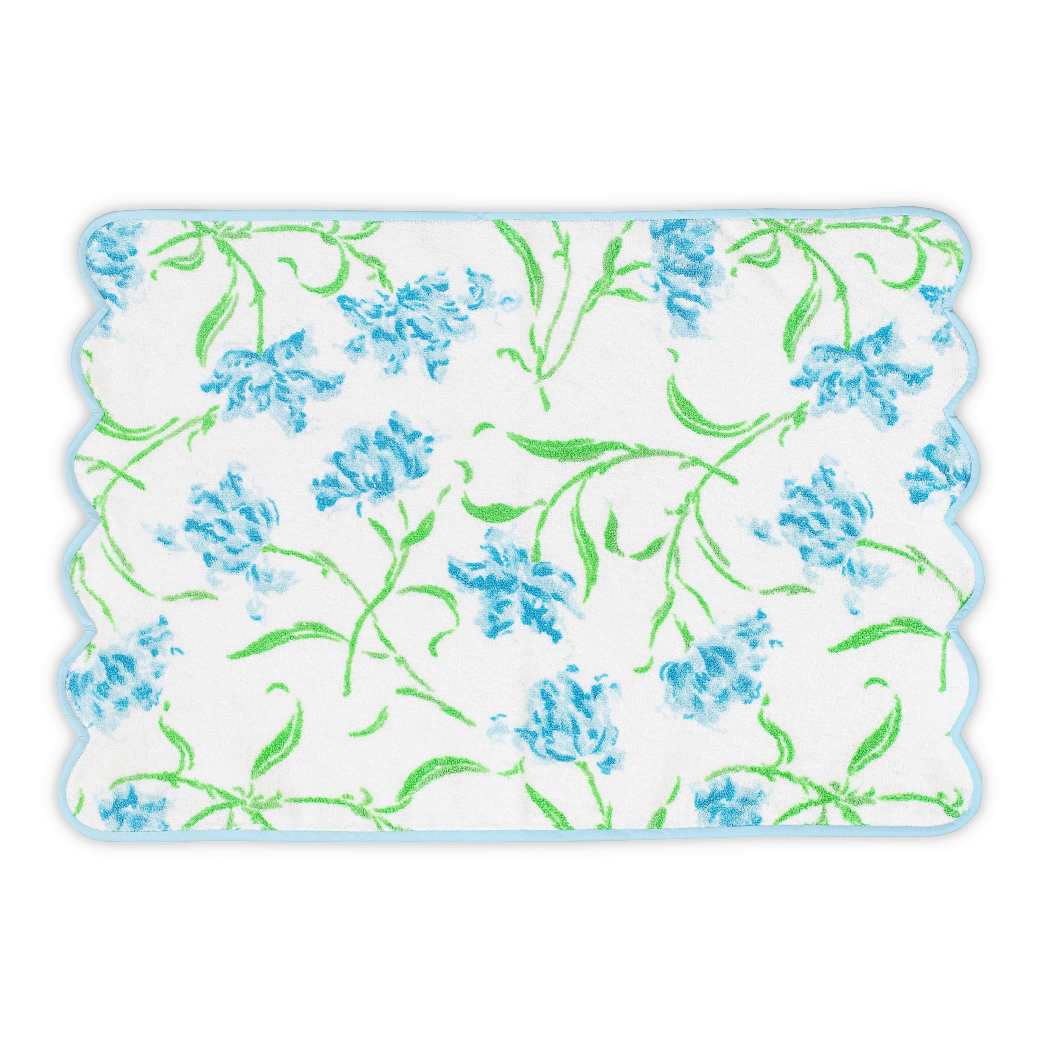 White Hand towel with blue and green floral print. Hand towel shows with a scallop blue bias. On a white background.