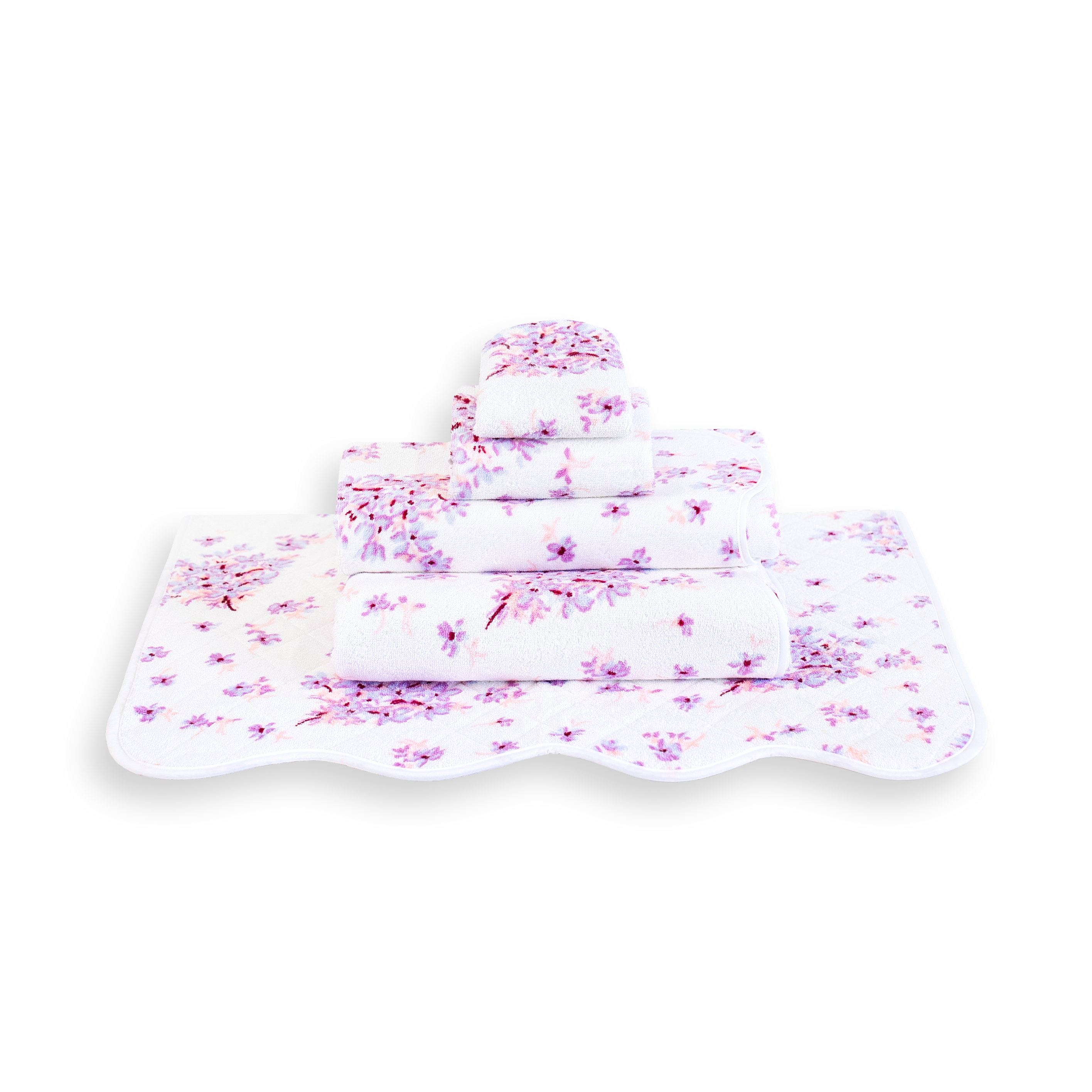 Printed lilac florals, Violettes Print, Folded Towel stack. Showing 1 of each size, from bottom to the top: Bathmat, Bath Sheet, Bath Towel, Hand Towel and Washcloth on a solid white background.