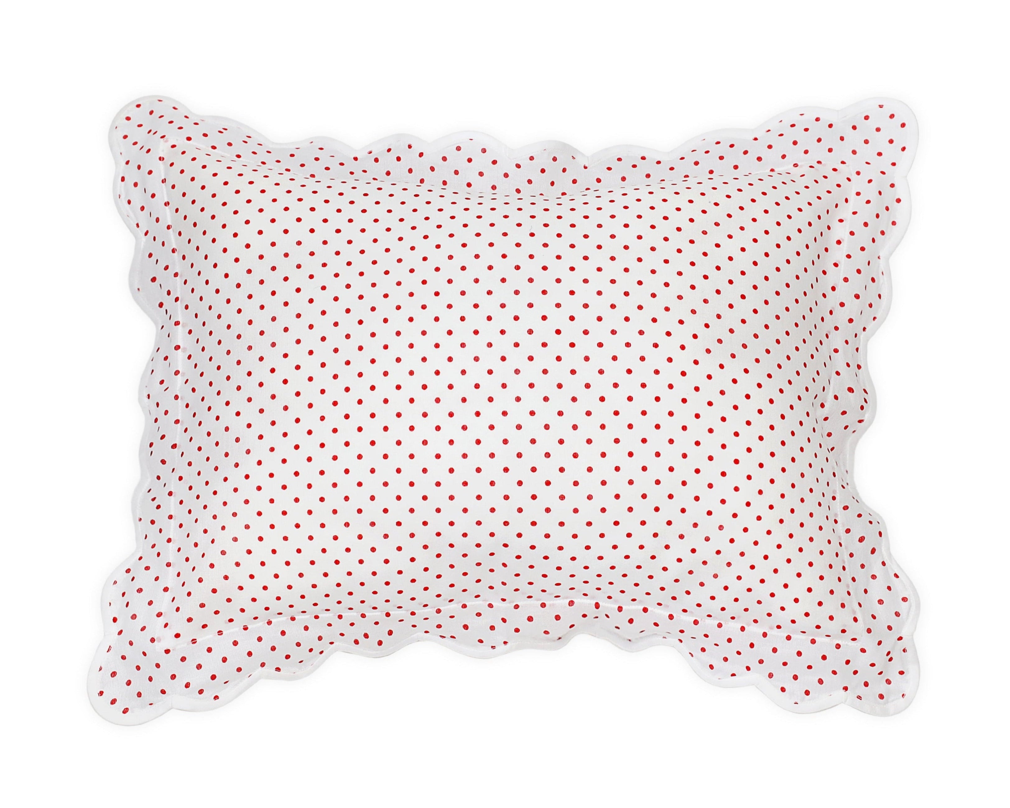 White pillow sham with red polka dots
